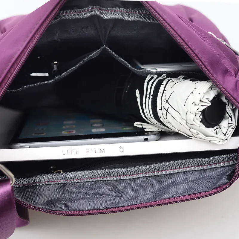 حقيبة كتف نايلون مقاومة للماء  - مراجعة Dual Phone Holder وسعره